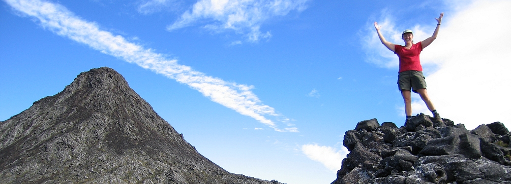 Standing on the crater rim of the Pico volcano, Pico island, Azores, Portugal