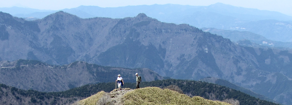 Hikers on the trail to the summit of Jirougyu in the mountains of Shikoku, Japan