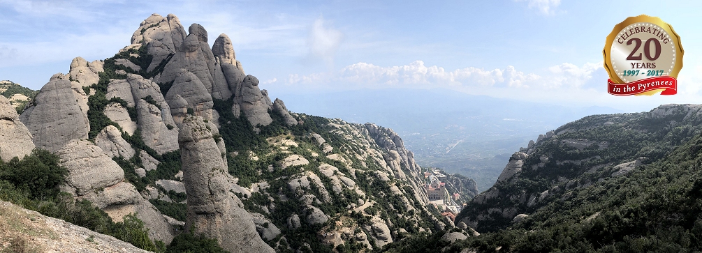 Trails wind around the sandstone spires at Monserrat en route to the Spanish Pyrenees