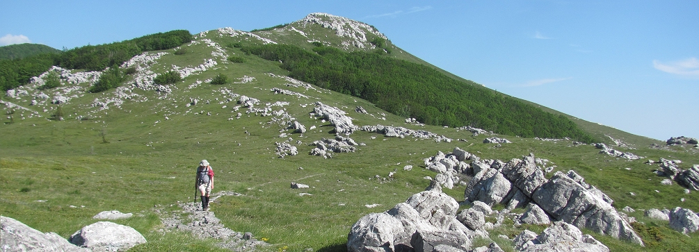 Hiker in the Dinaric Alps (Velebit Mountains), Croatia