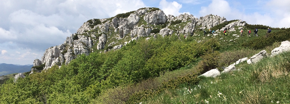 HIkers on Snjeznik in the mountains of Croatia