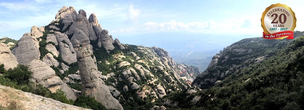 Trails wind around the sandstone spires at Monserrat en route to the Spanish Pyrenees