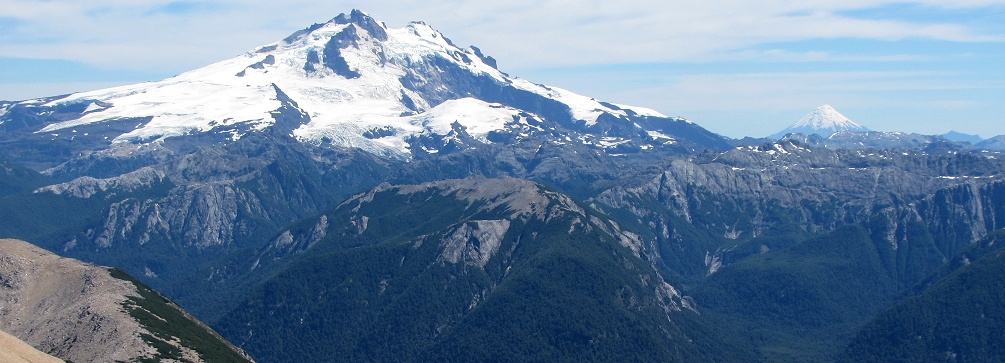 Snow-capped volcanoes on the crest of the Andes.